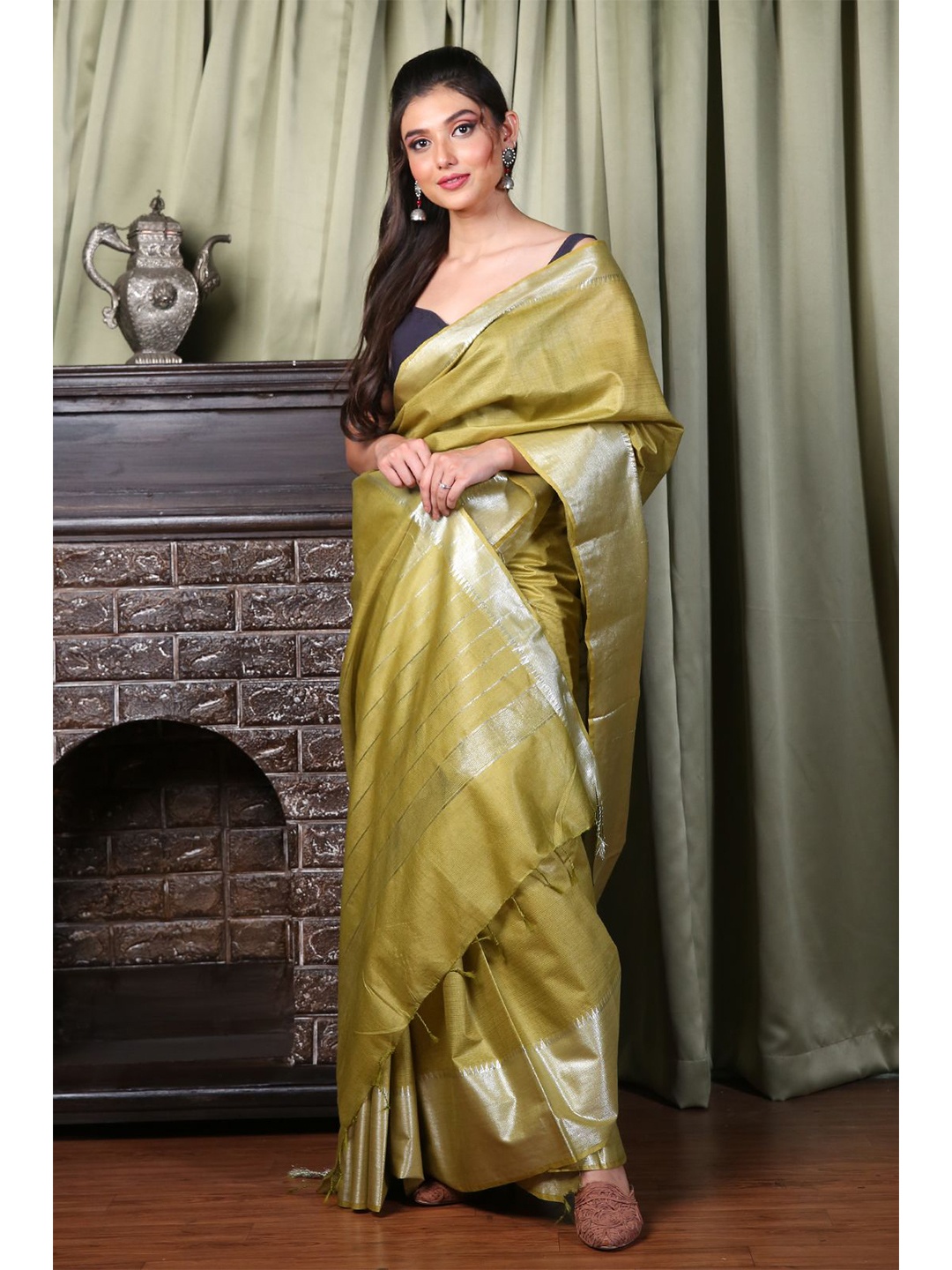 

Charukriti Olive Green & Silver-Toned Zari Silk Blend Saree