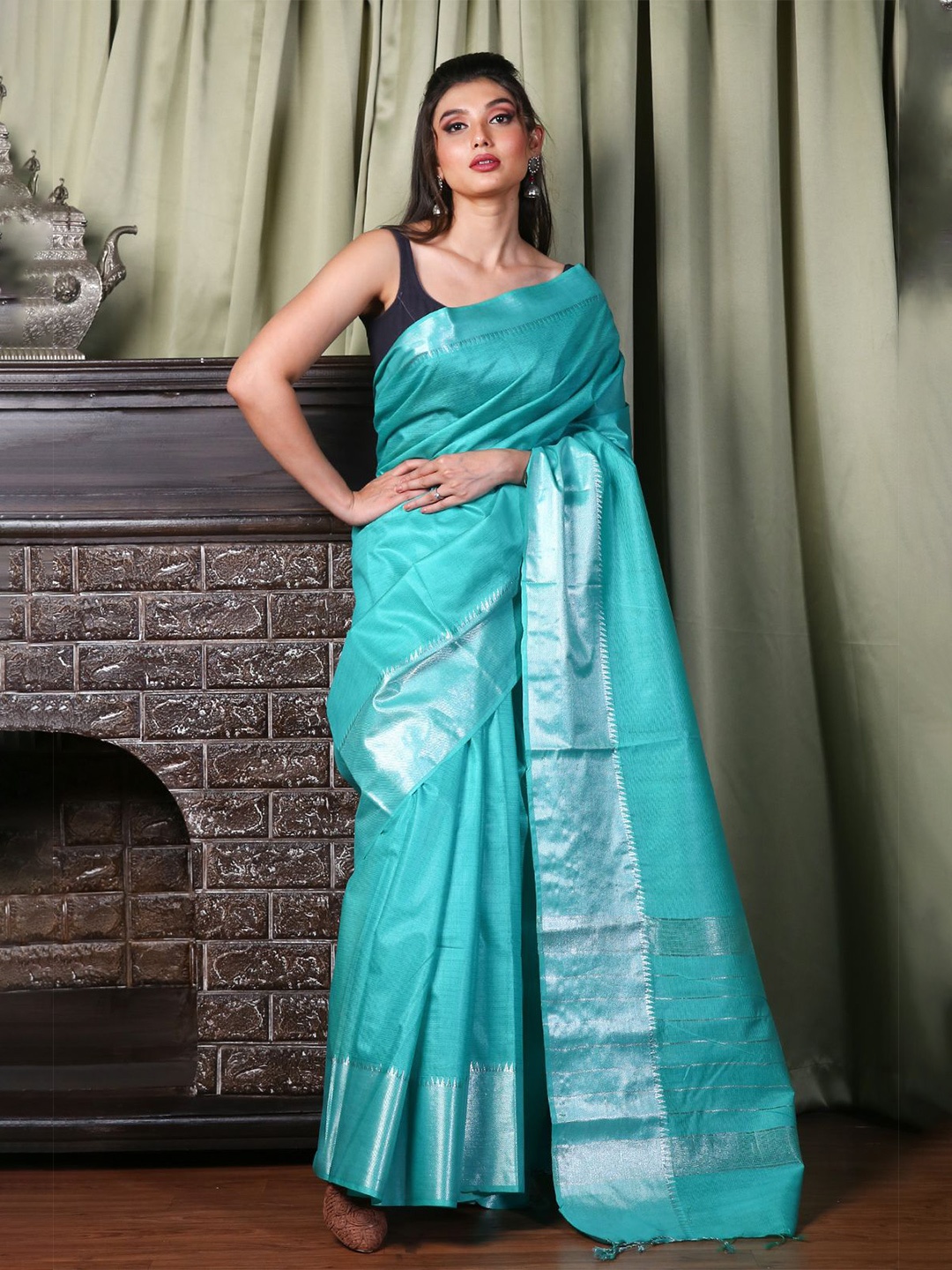 

Charukriti Sea Green Silk Blend Saree