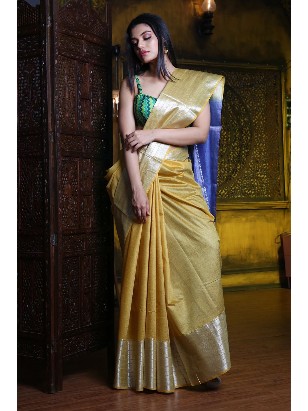 

Charukriti Yellow & Gold-Toned Zari Silk Blend Saree