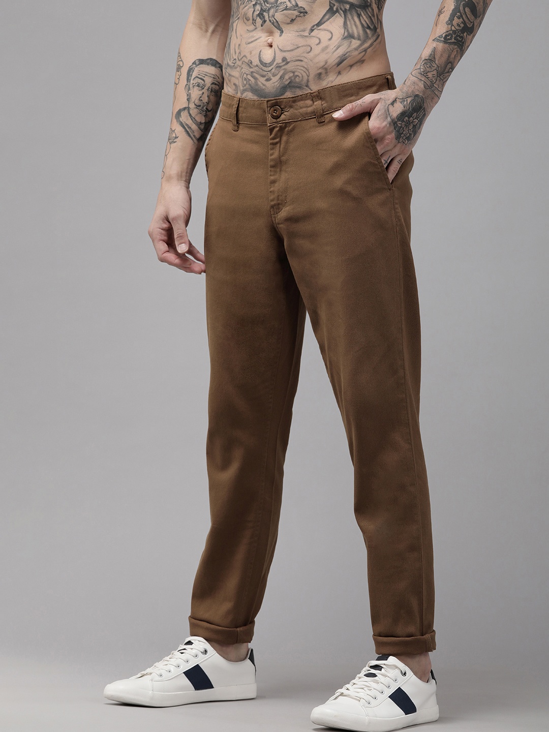 

The Roadster Lifestyle Co Men Khaki Slim Fit Mid-Rise Regular Trousers