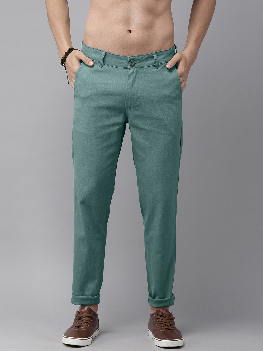 

The Roadster Lifestyle Co. Men Green Solid Regular Trousers