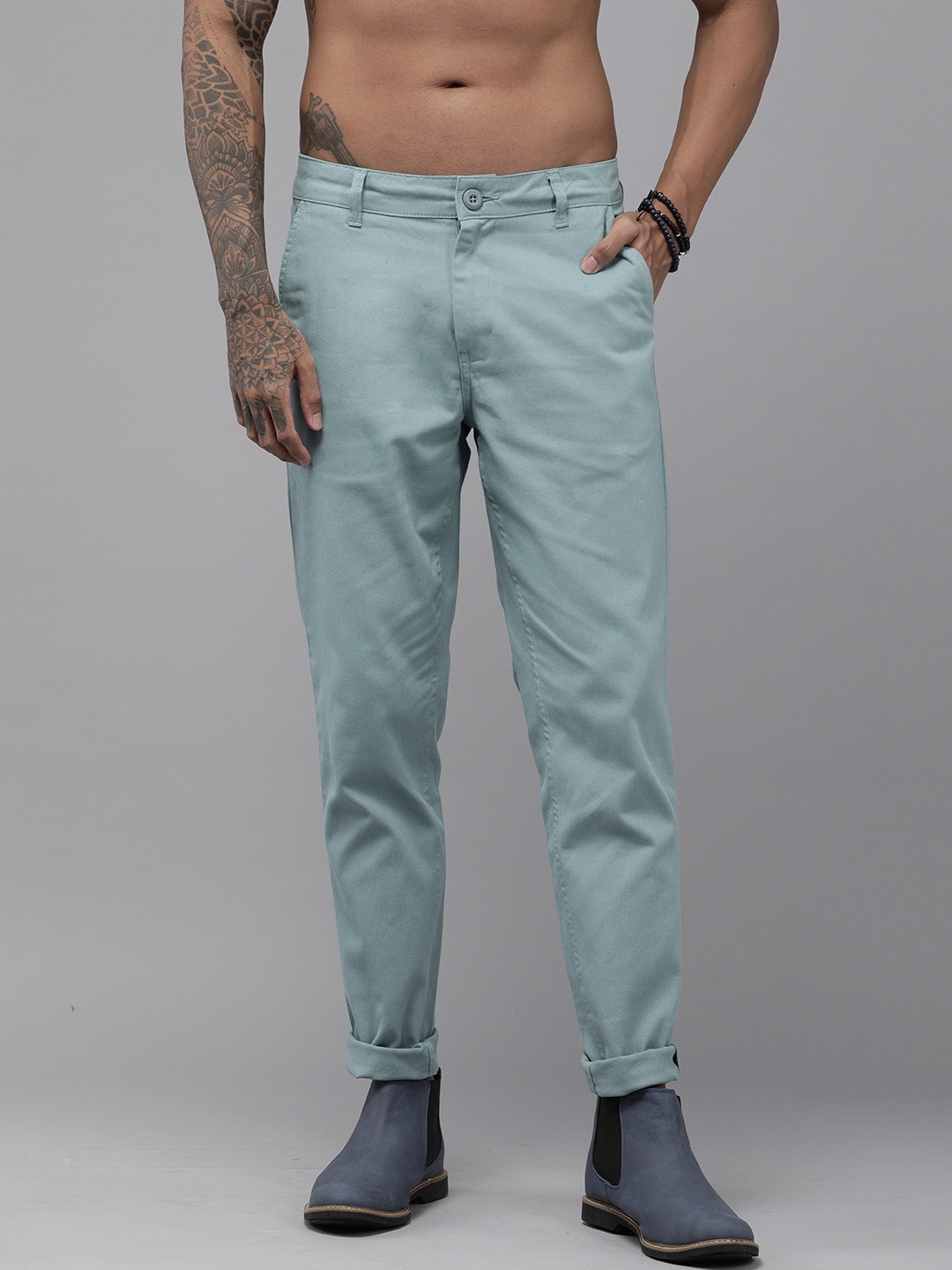 

The Roadster Lifestyle Co. Men Green Solid Slim Fit Trousers