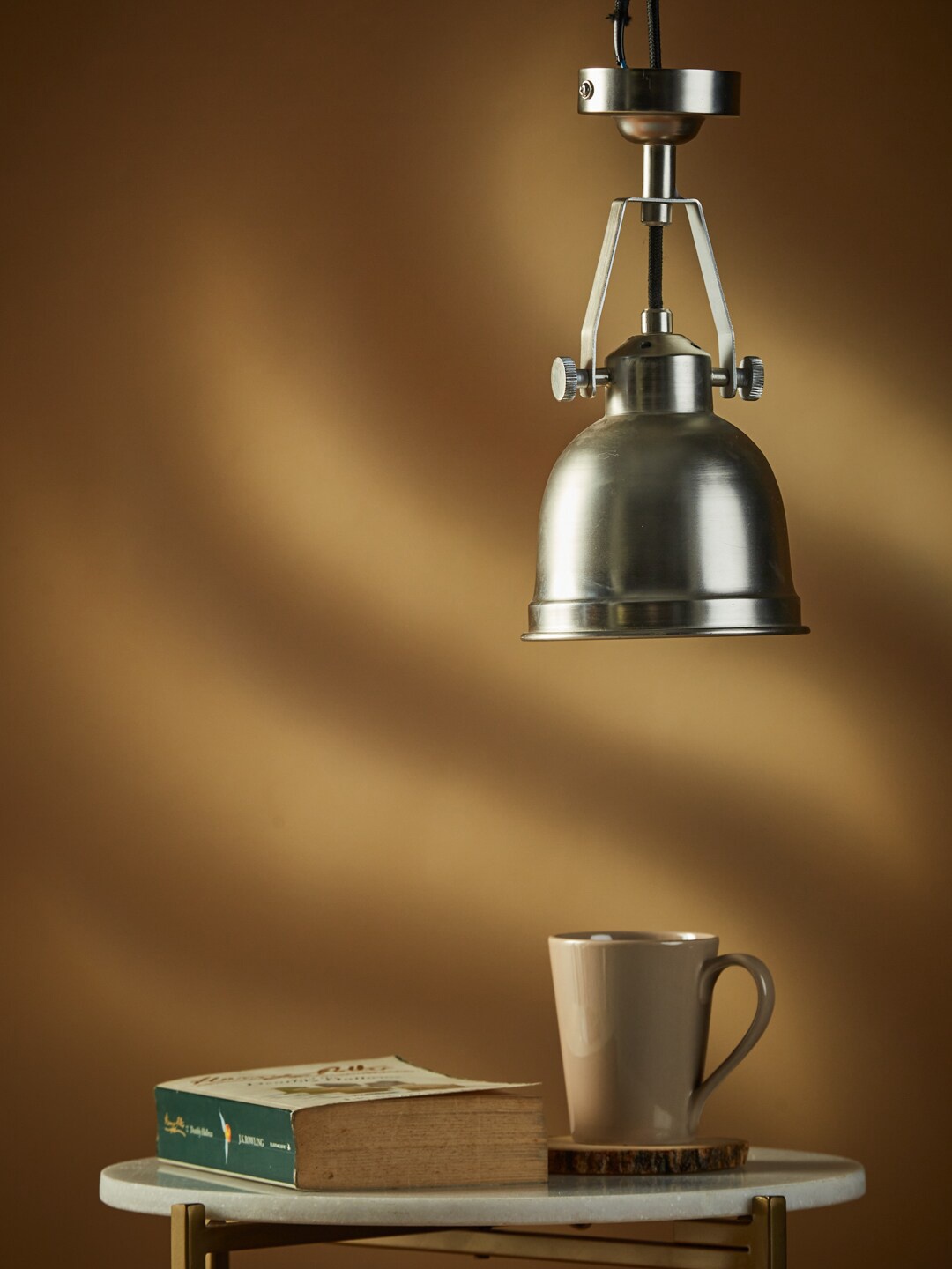 

Fabindia Silver-Toned Nickel Wall Lamp