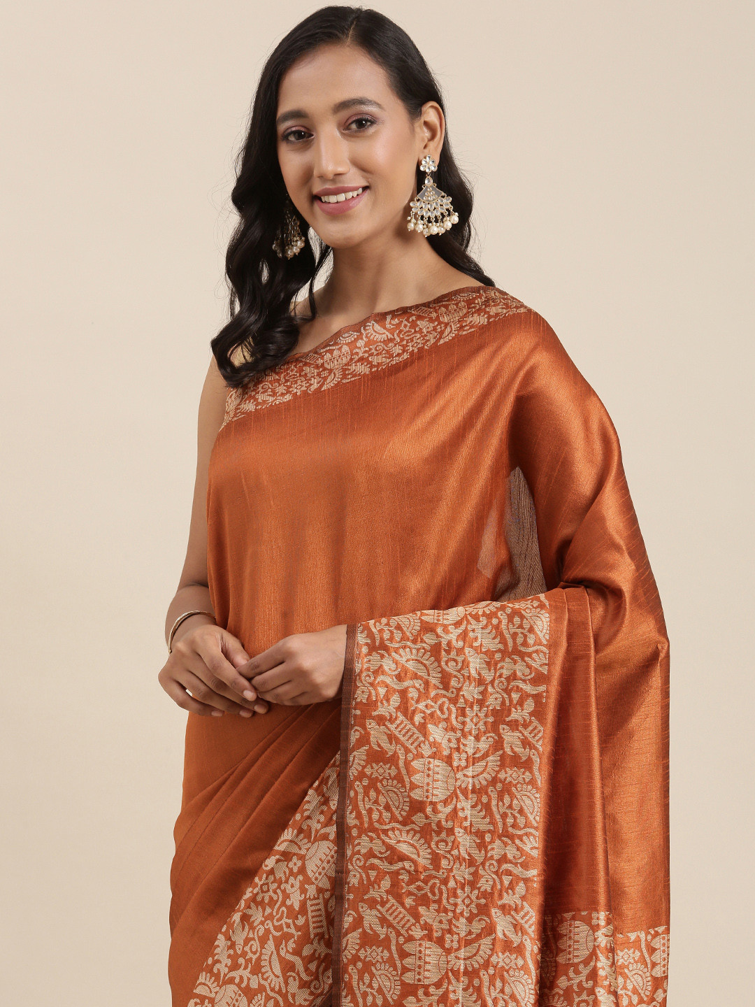 

Mitera Rust Orange Solid Handloom Saree