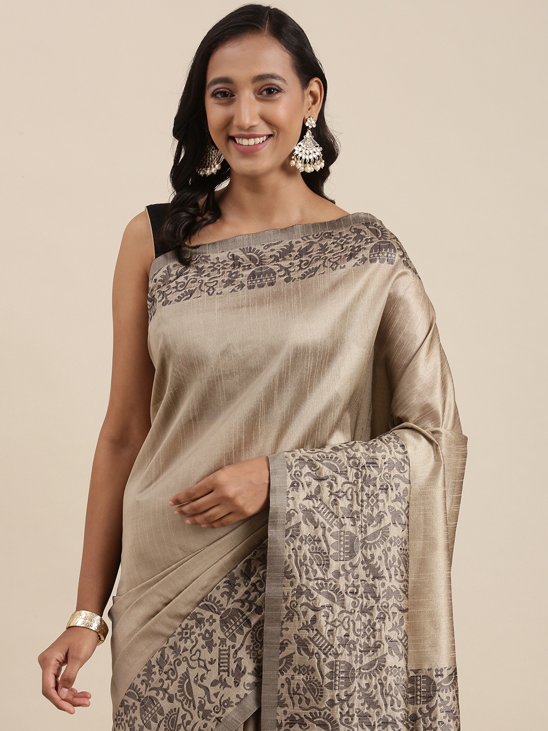 

Mitera Beige Solid Handloom Saree