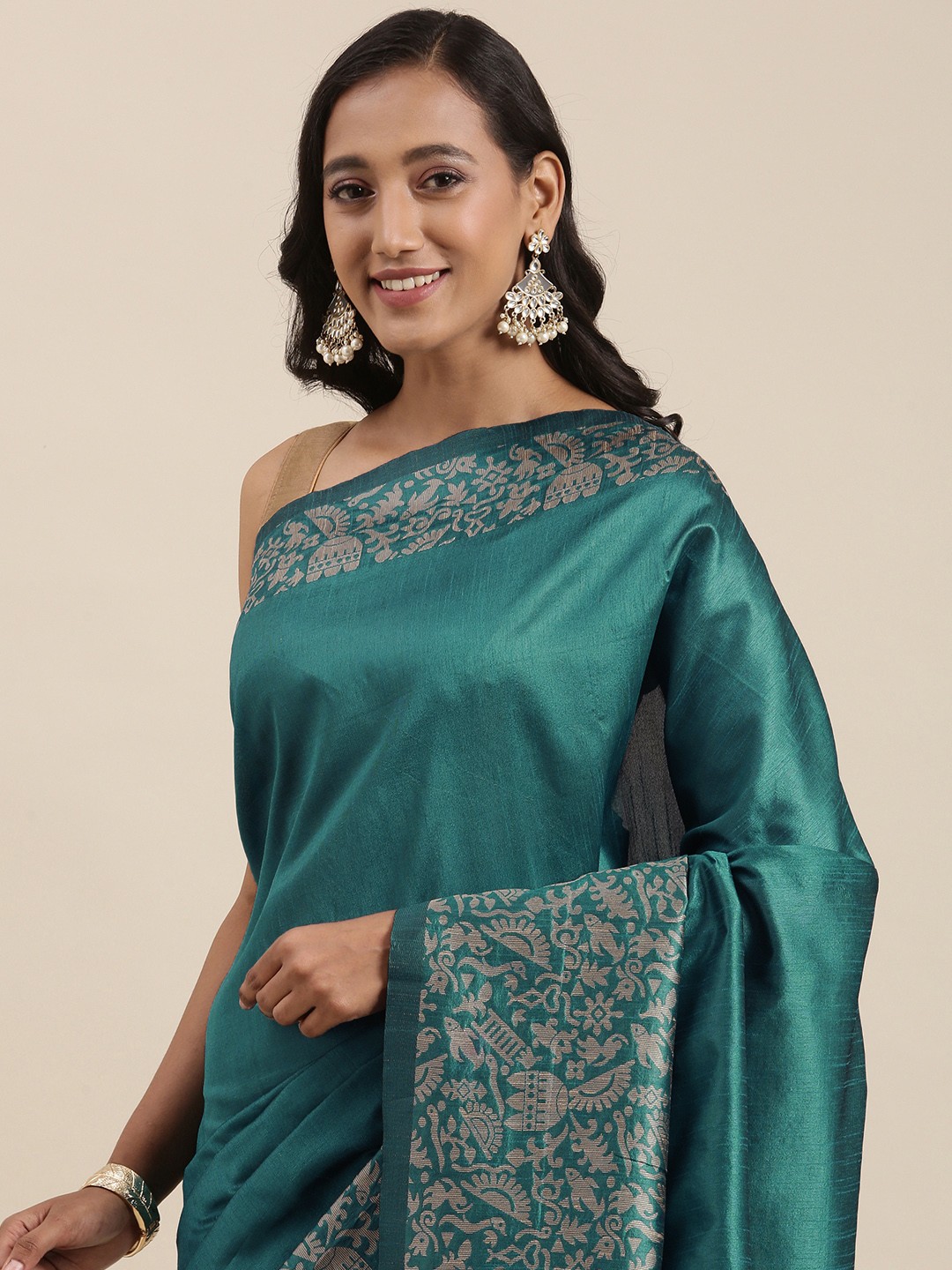 

Mitera Blue Solid Handloom Saree