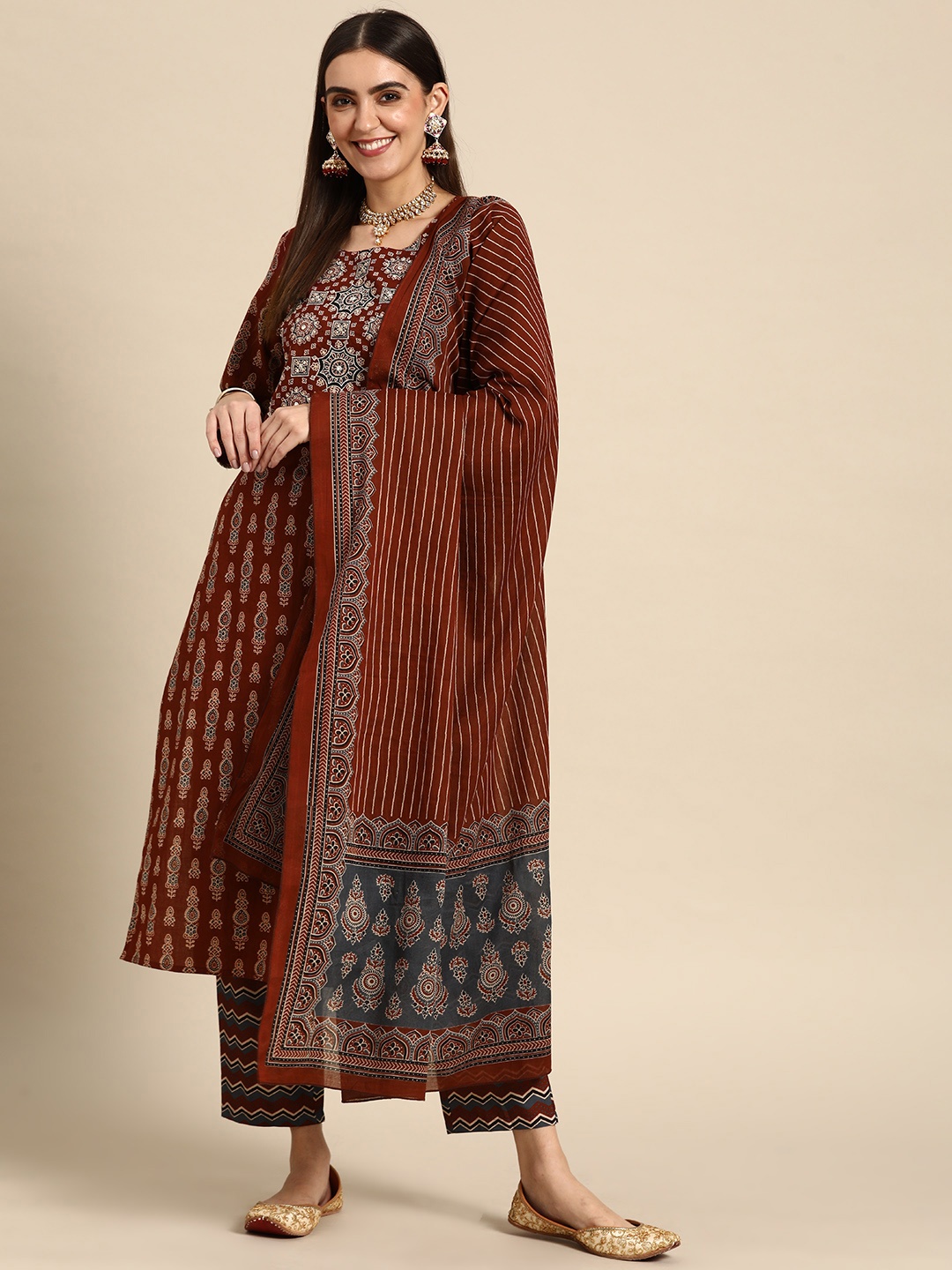 

Prakrti Women Rust Red Pure Cotton Ethnic Motifs Printed Kurta with Trousers & Dupatta