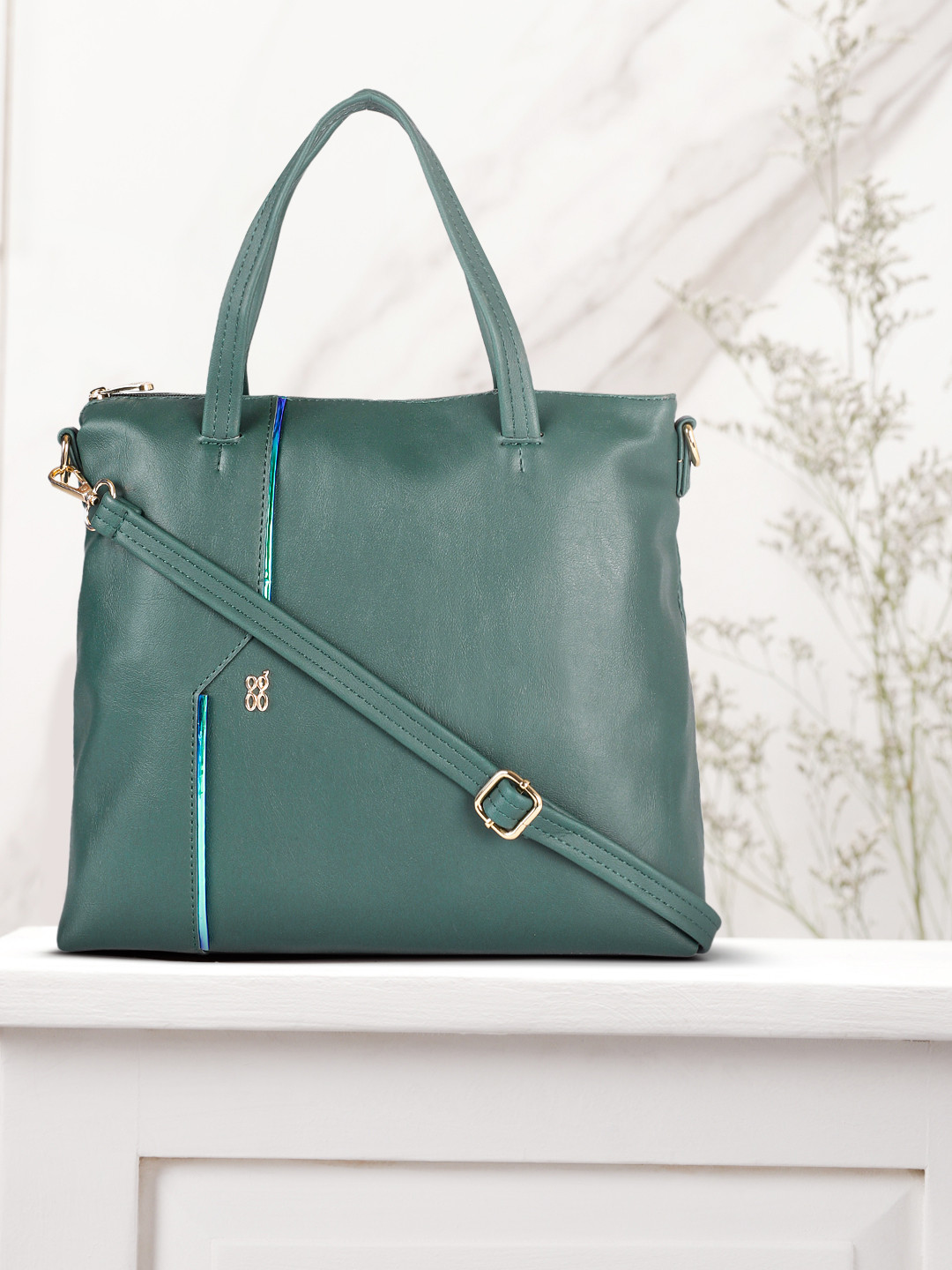 

Baggit Teal Green Solid Structured Handheld Bag