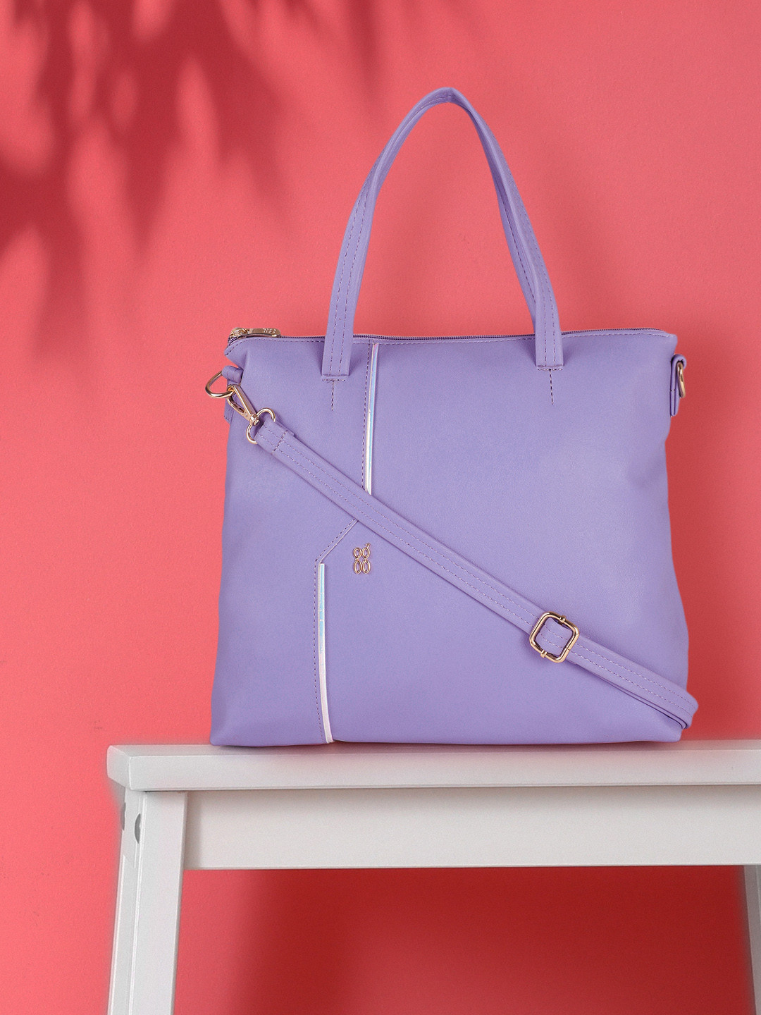 

Baggit Purple Solid Structured Handheld Bag