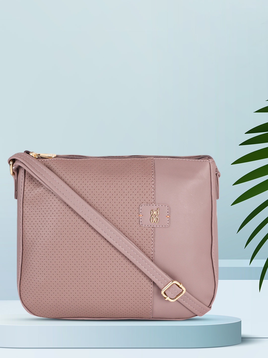 

Baggit Women Purple Textured Structured Sling Bag