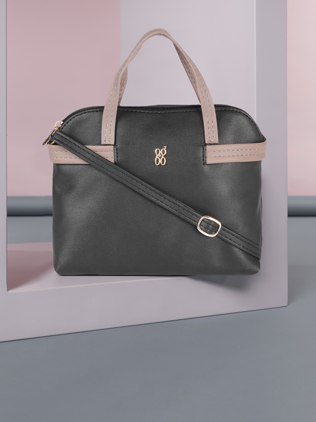 

Baggit Women Black Solid Structured Handheld Bag