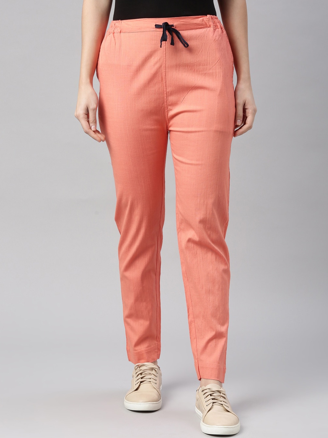 

Kryptic Women Peach-Coloured Solid Slim Fit Trousers