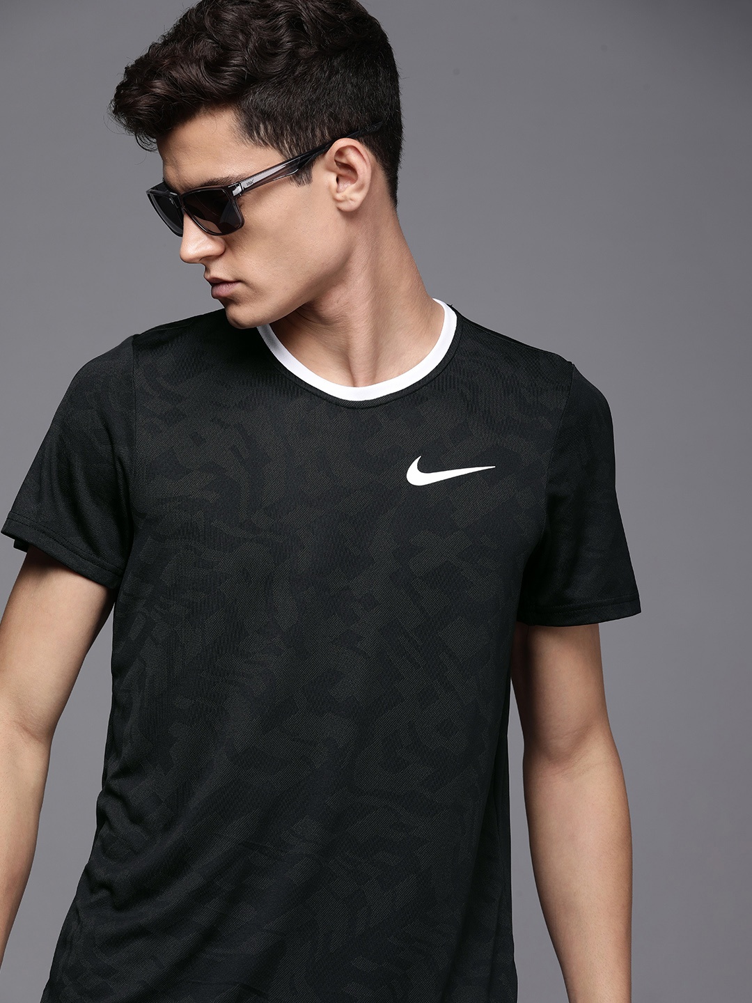 

Nike Men Black & White Brand Logo Printed Superset T-shirt