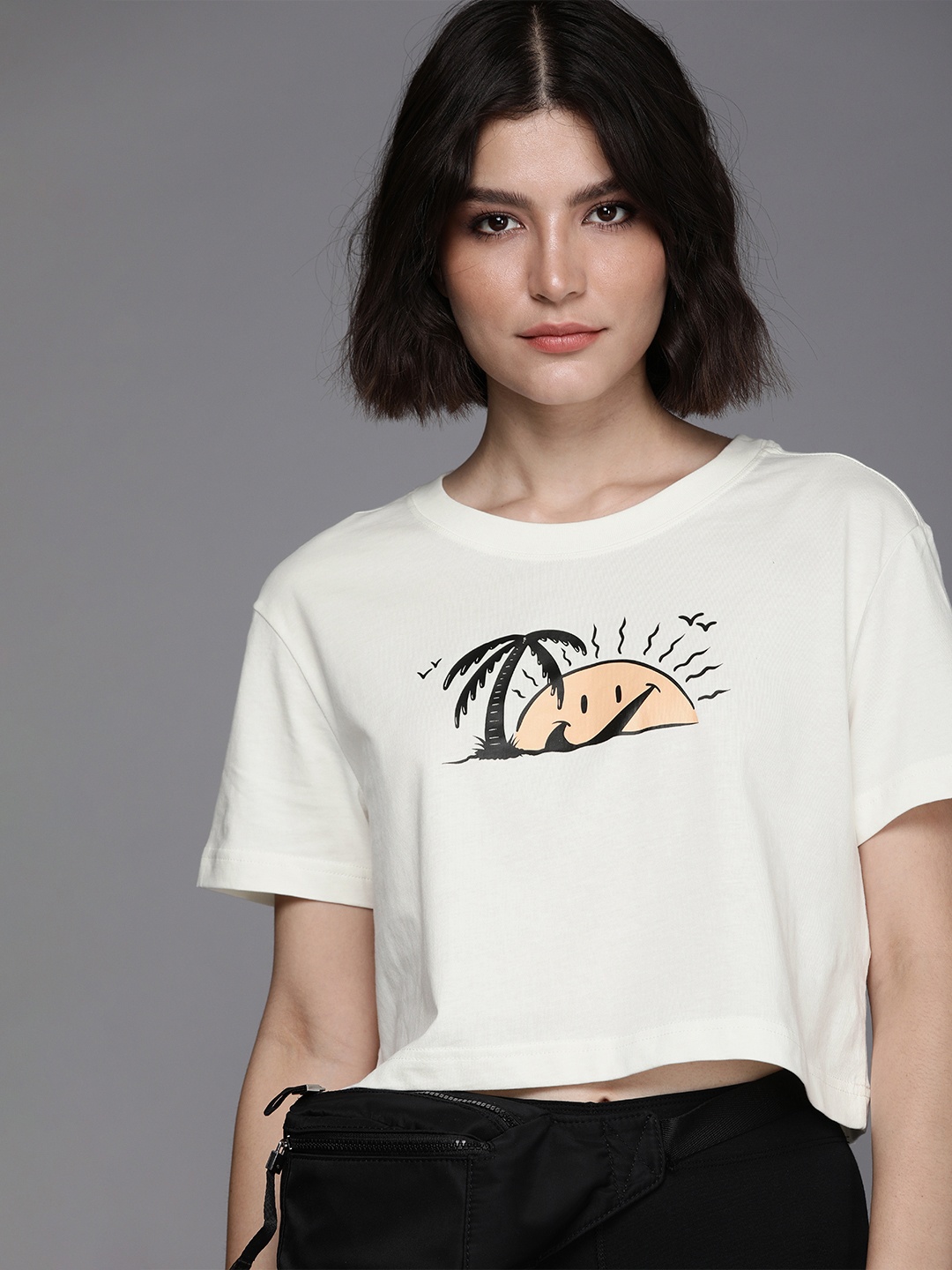 

Nike Women Off White & Black Graphic Printed Pure Cotton Crop Top