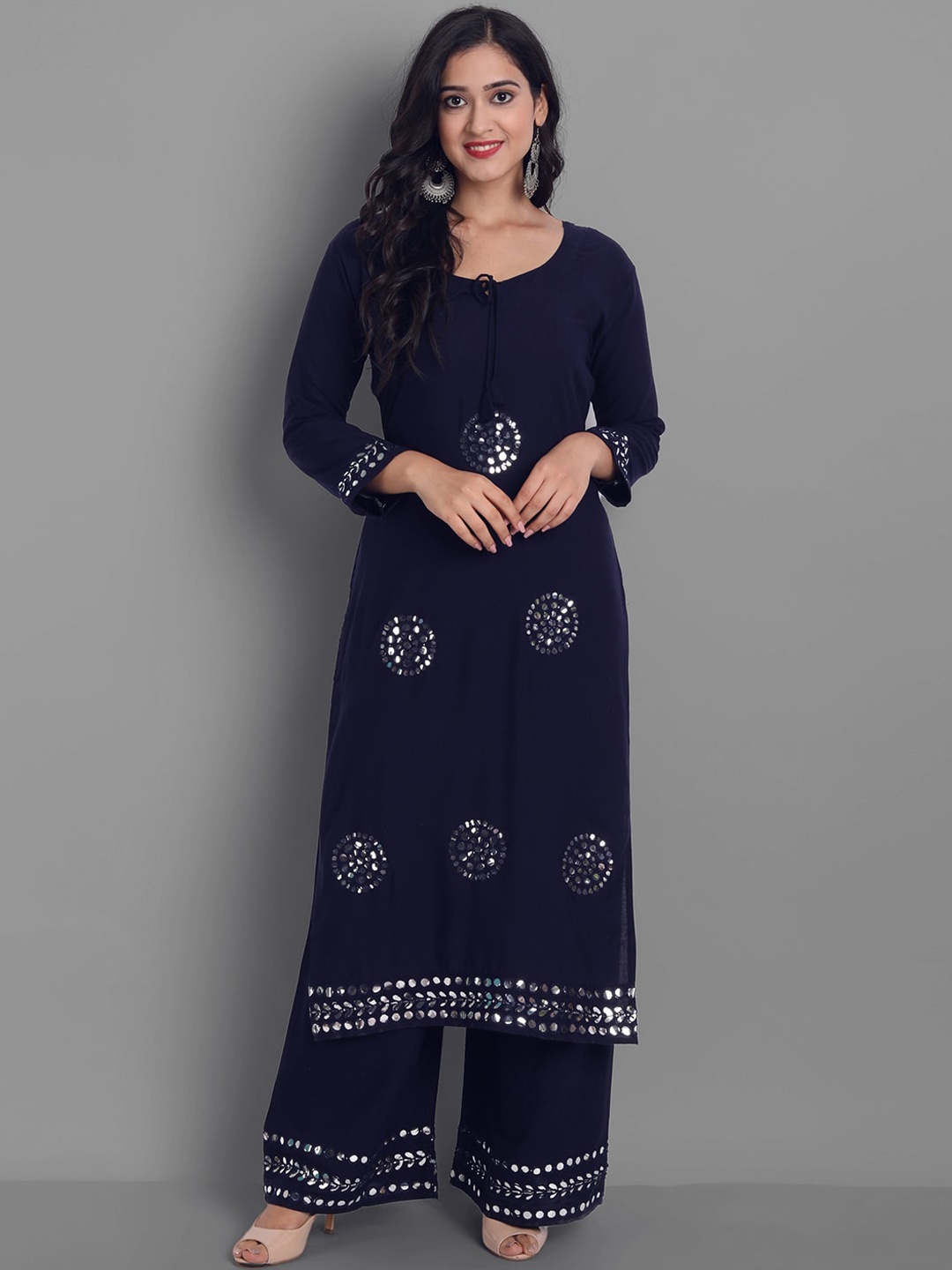 

Ziva Fashion Women Navy Blue Floral Embroidered Mirror Work Kurta with Palazzos