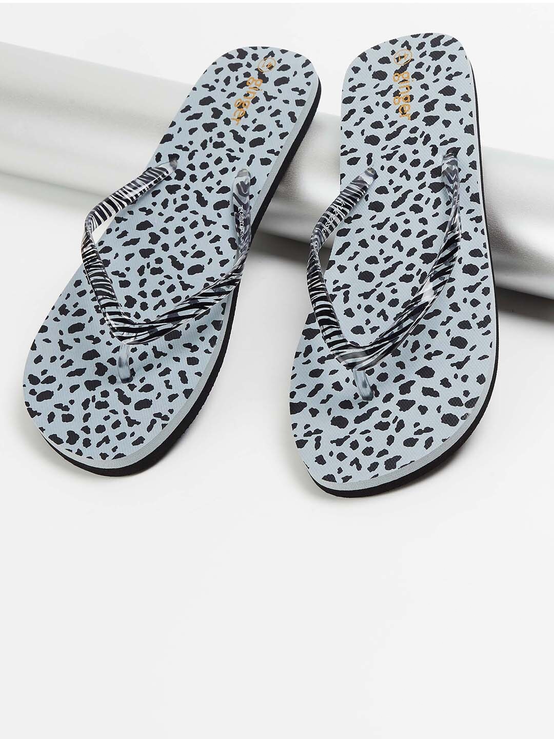 

Ginger by Lifestyle Women Black & Blue Printed Rubber Thong Flip-Flops