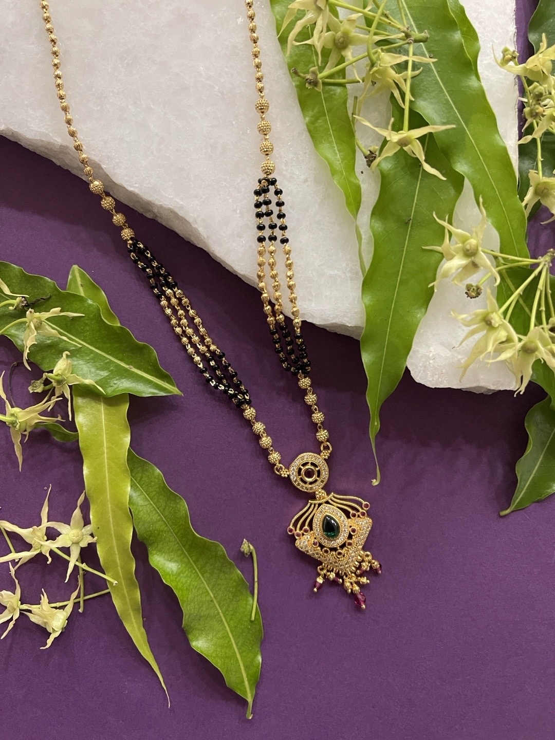 

Digital Dress Room Women Gold-Plated Black Beaded Pink & Green AD-Stone Mangalsutra