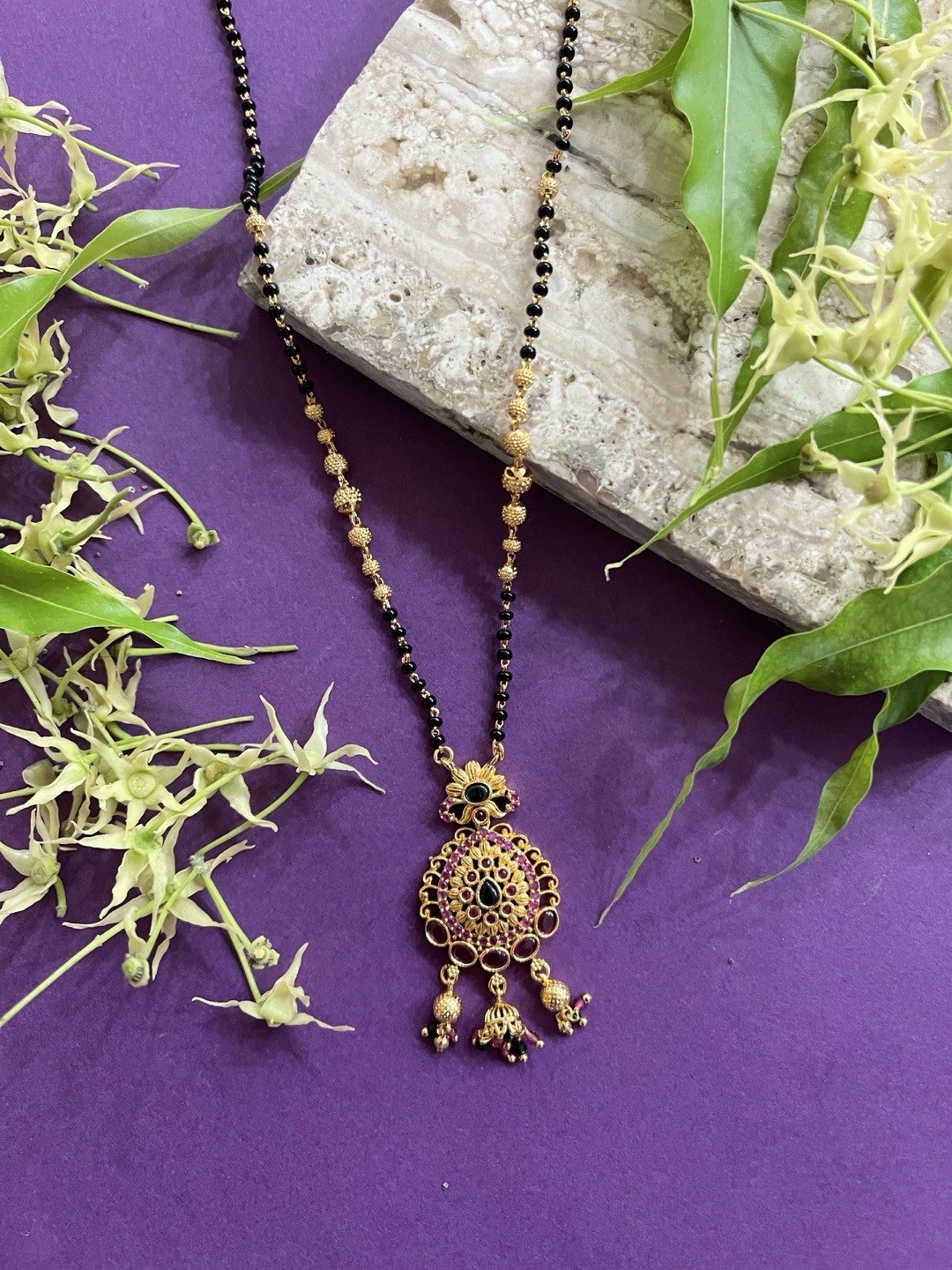 

Digital Dress Room Gold-Plated Black Beaded Pink & Green AD Stone Studded Mangalsutra