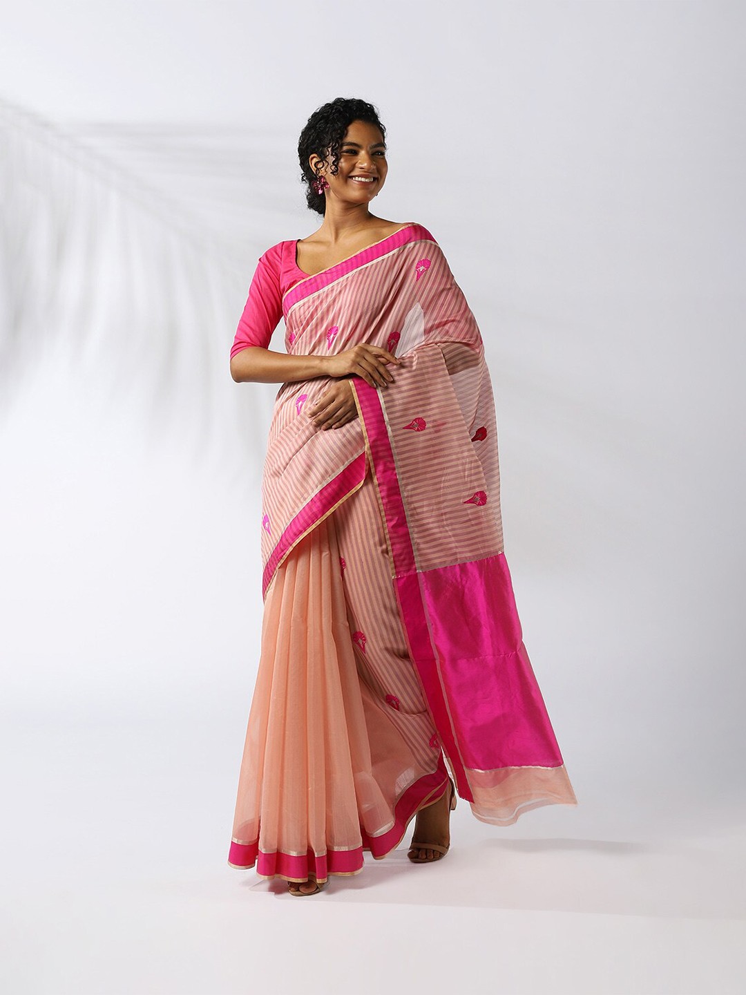 

Taneira Pink & Fuchsia Striped Chanderi Saree