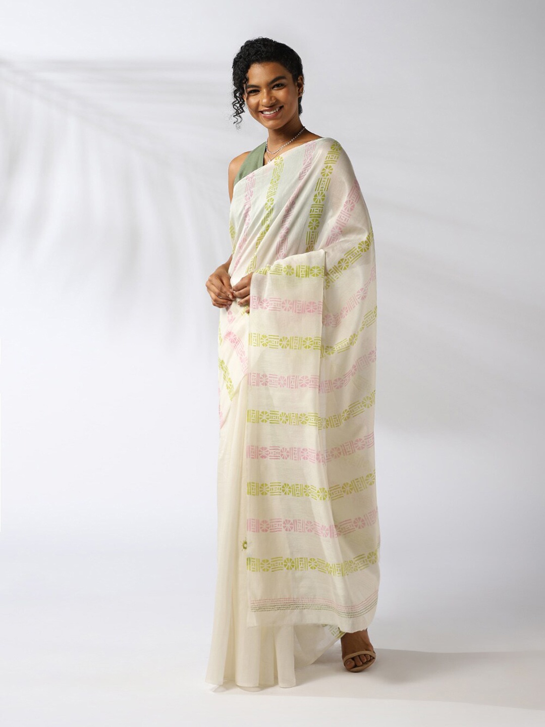 

Taneira Off White & Green Ethnic Motifs Silk Cotton Saree