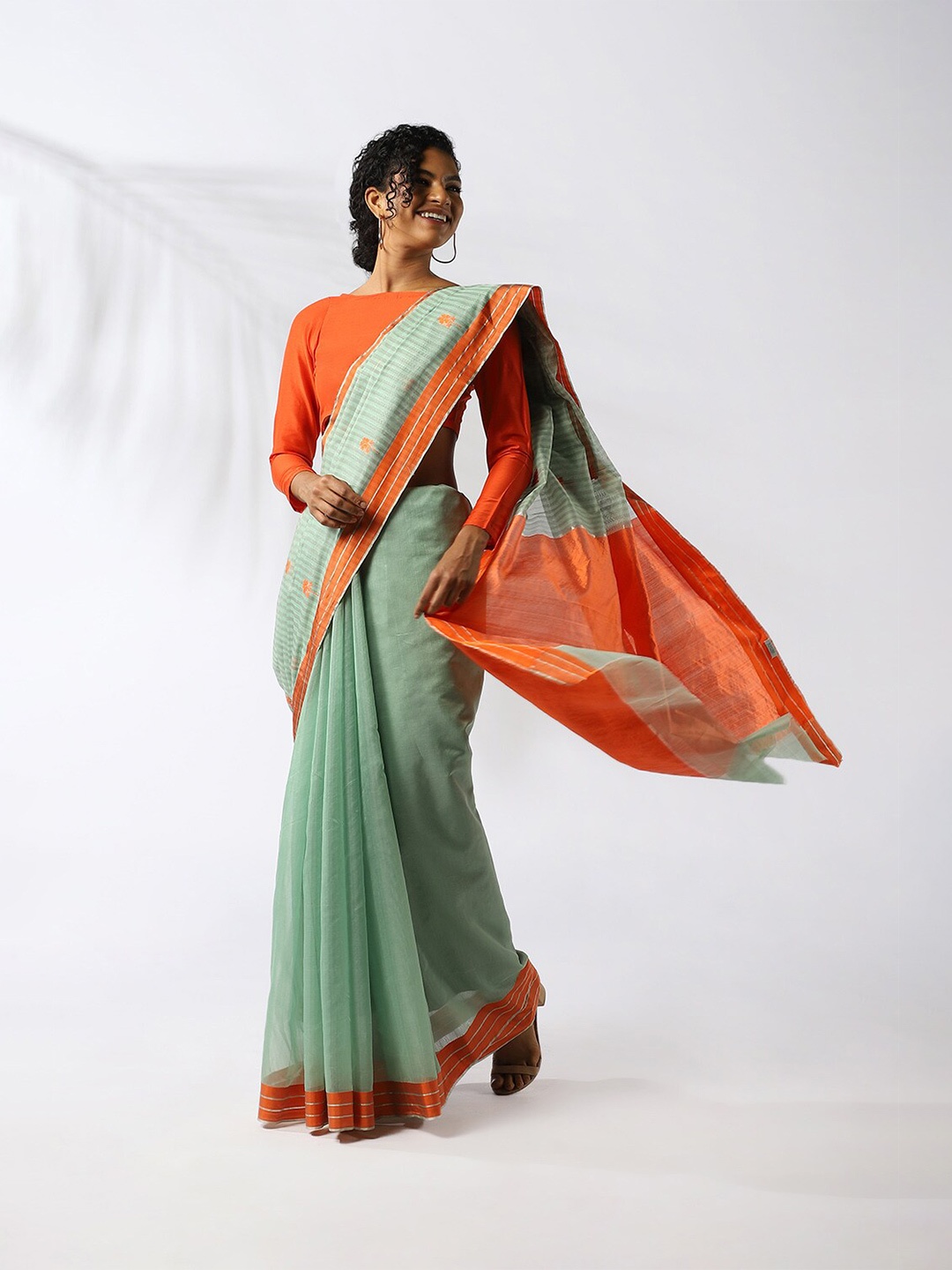 

Taneira Mint Green & Orange Striped Silk Cotton Chanderi Saree