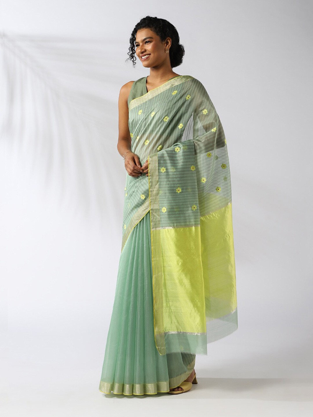 

Taneira Green & Yellow Floral Silk Cotton Chanderi Saree