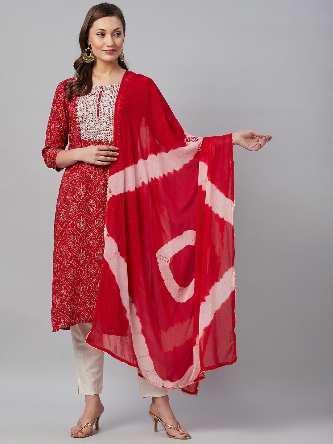 

HIGHLIGHT FASHION EXPORT Women Red Bandhani Printed Kurta with Trousers & Dupatta