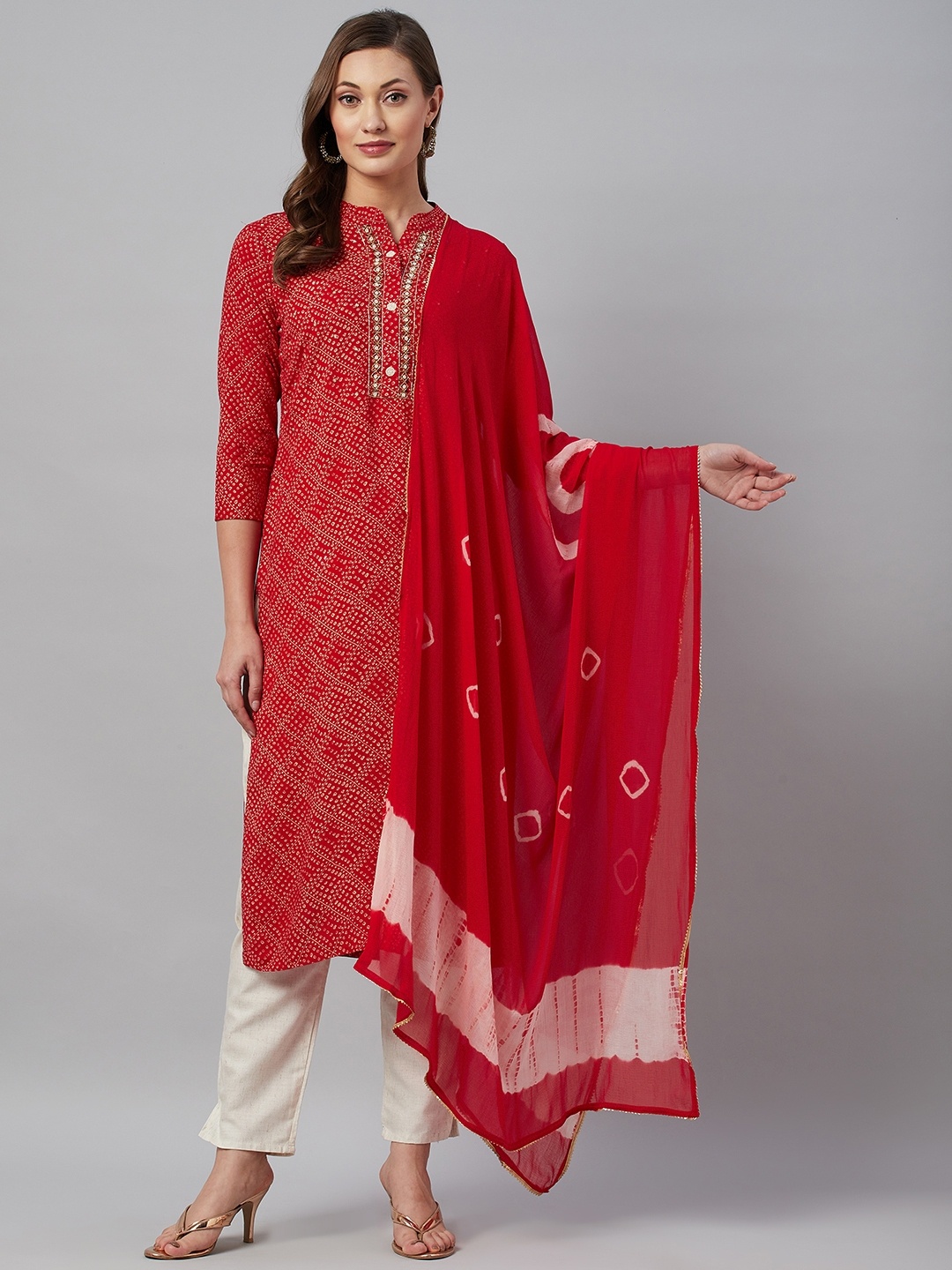 

HIGHLIGHT FASHION EXPORT Women Red Bandhani Printed Kurta with Trousers & Dupatta