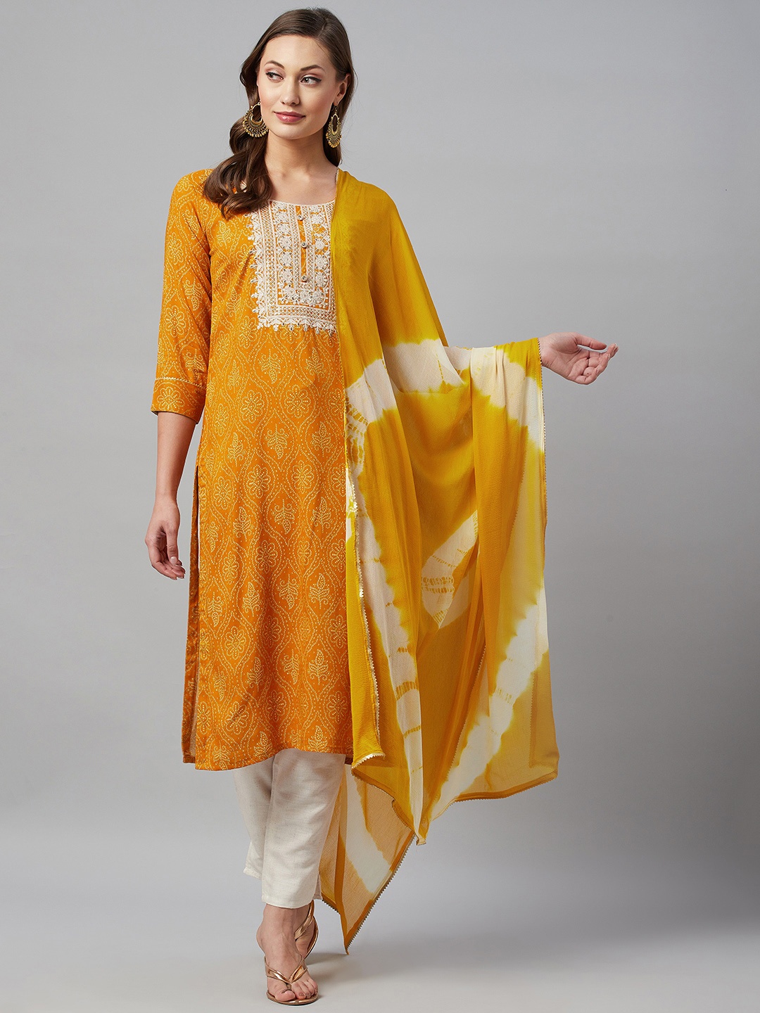 

HIGHLIGHT FASHION EXPORT Women Yellow Bandhani Printed Kurta with Trousers & Dupatta