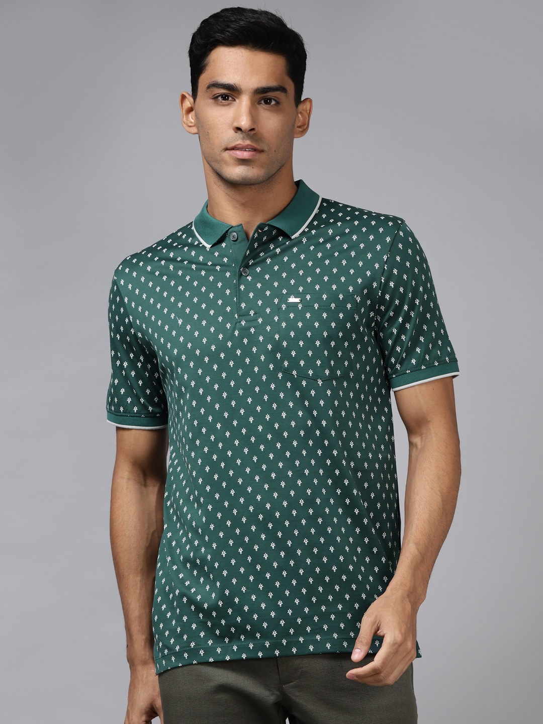 

Van Heusen Men Green & White Printed Polo Collar Pure Cotton T-shirt