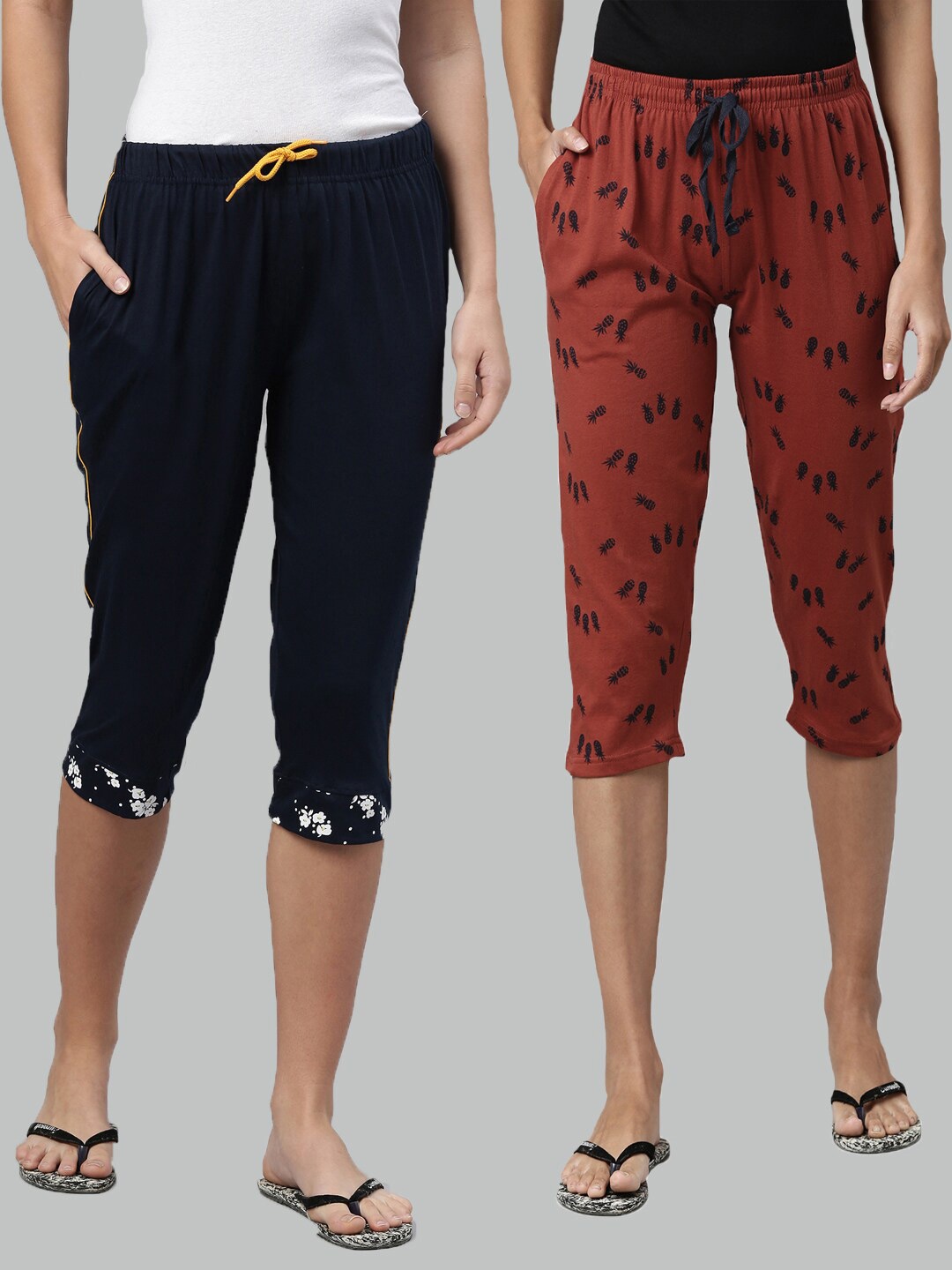 

Kryptic Women Navy Blue & Rust Printed Capris