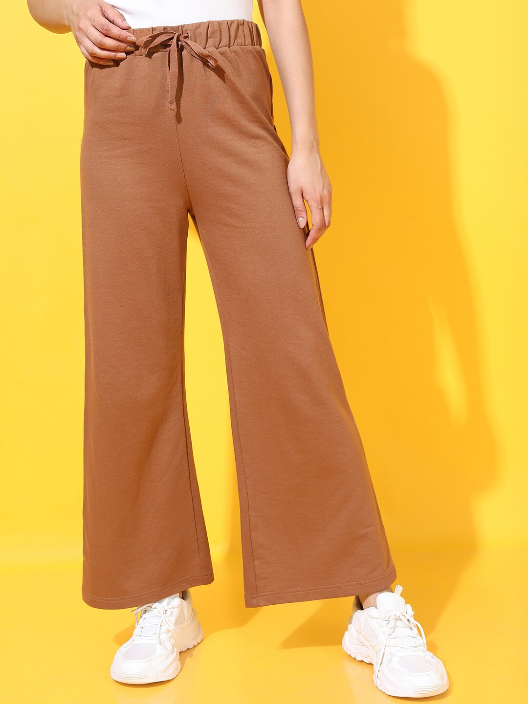 

Tokyo Talkies Women Brown Flared Trousers