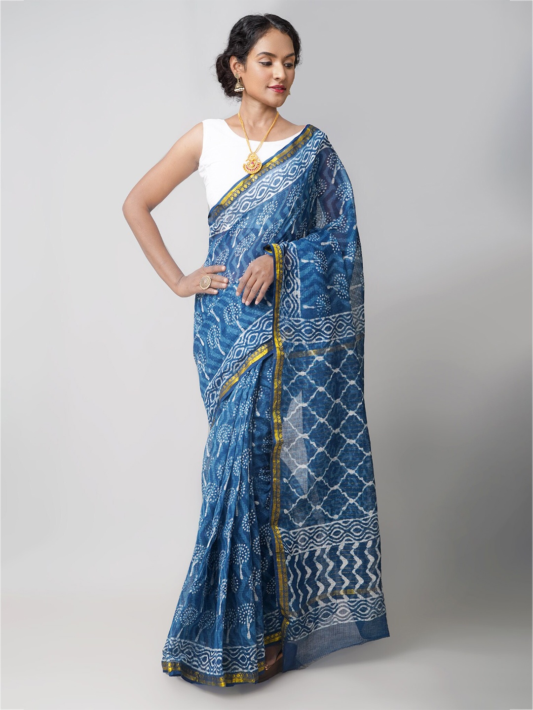 

Unnati Silks Blue & White Ethnic Motifs Zari Pure Cotton Kota Saree