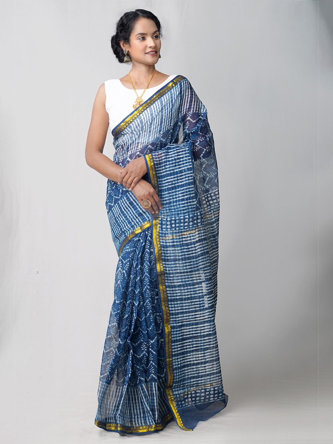 

Unnati Silks Blue & White Ethnic Motifs Pure Cotton Kota Saree