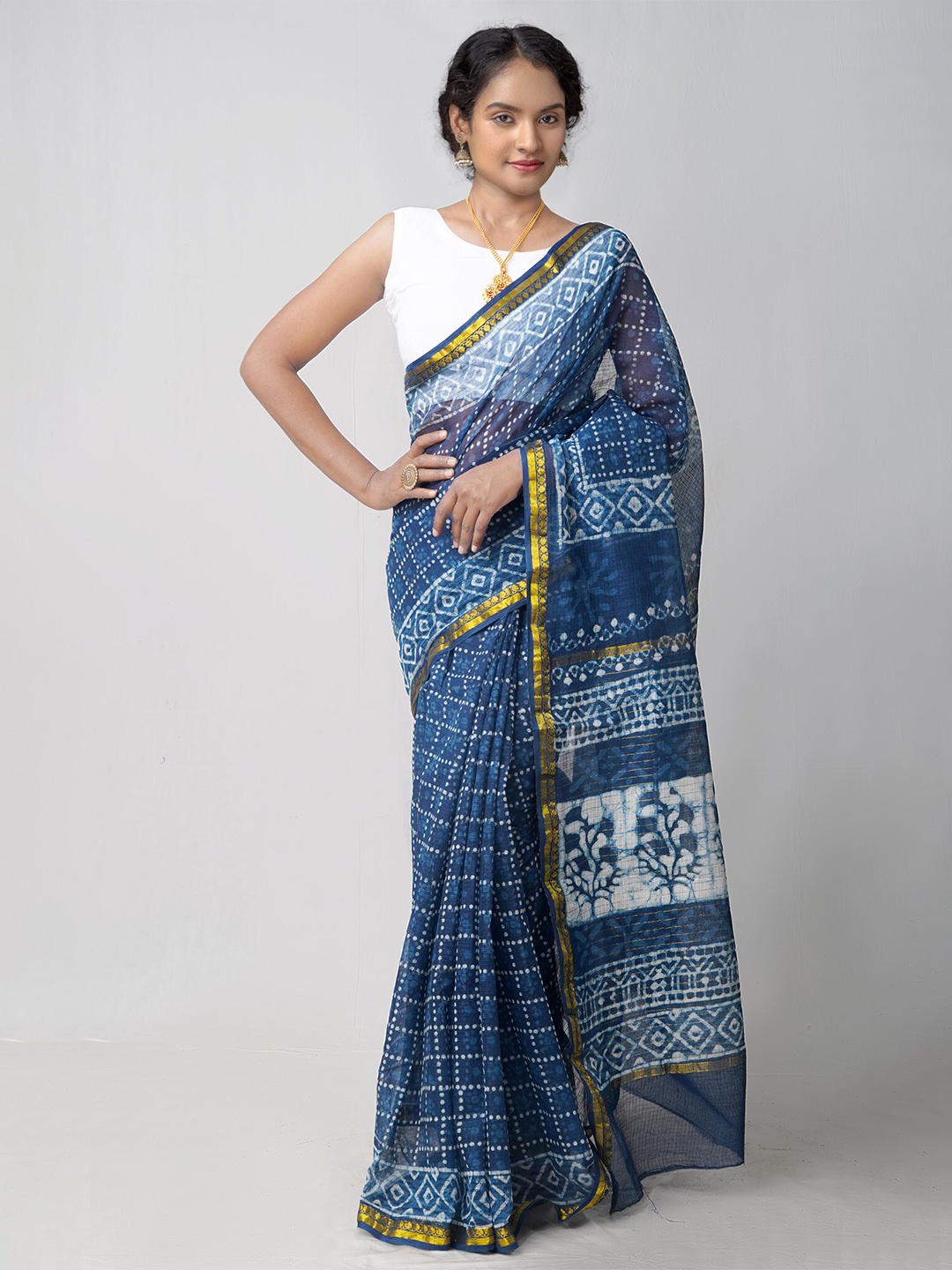 

Unnati Silks Blue & White Ethnic Motifs Zari Pure Cotton Kota Saree
