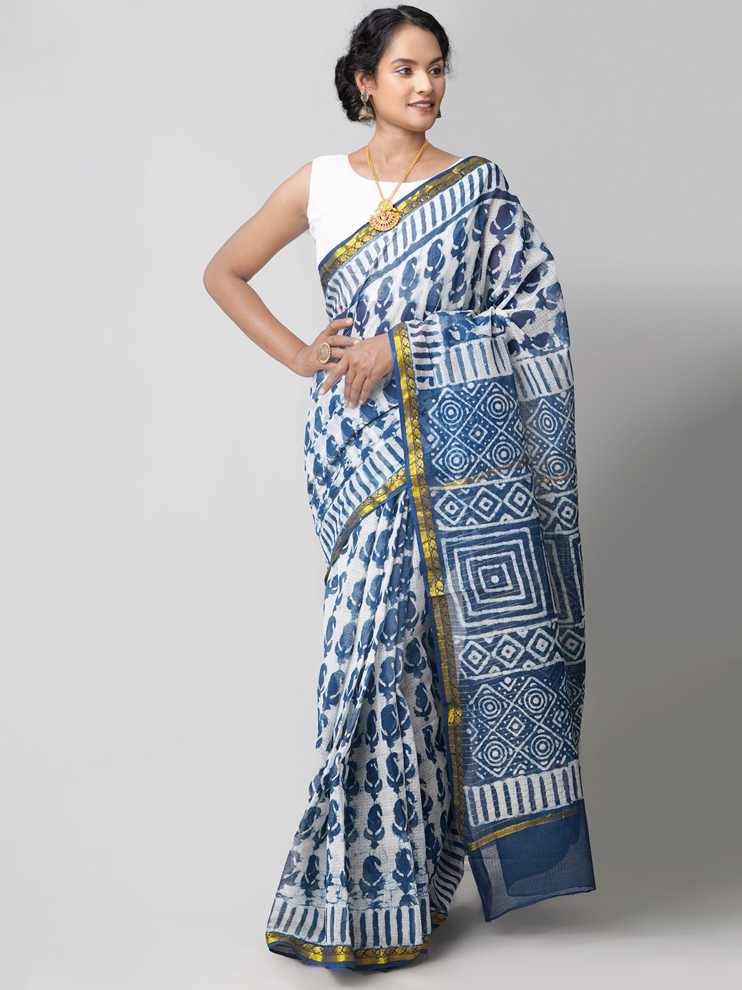 

Unnati Silks Blue & White Ethnic Motifs Zari Pure Cotton Kota Saree