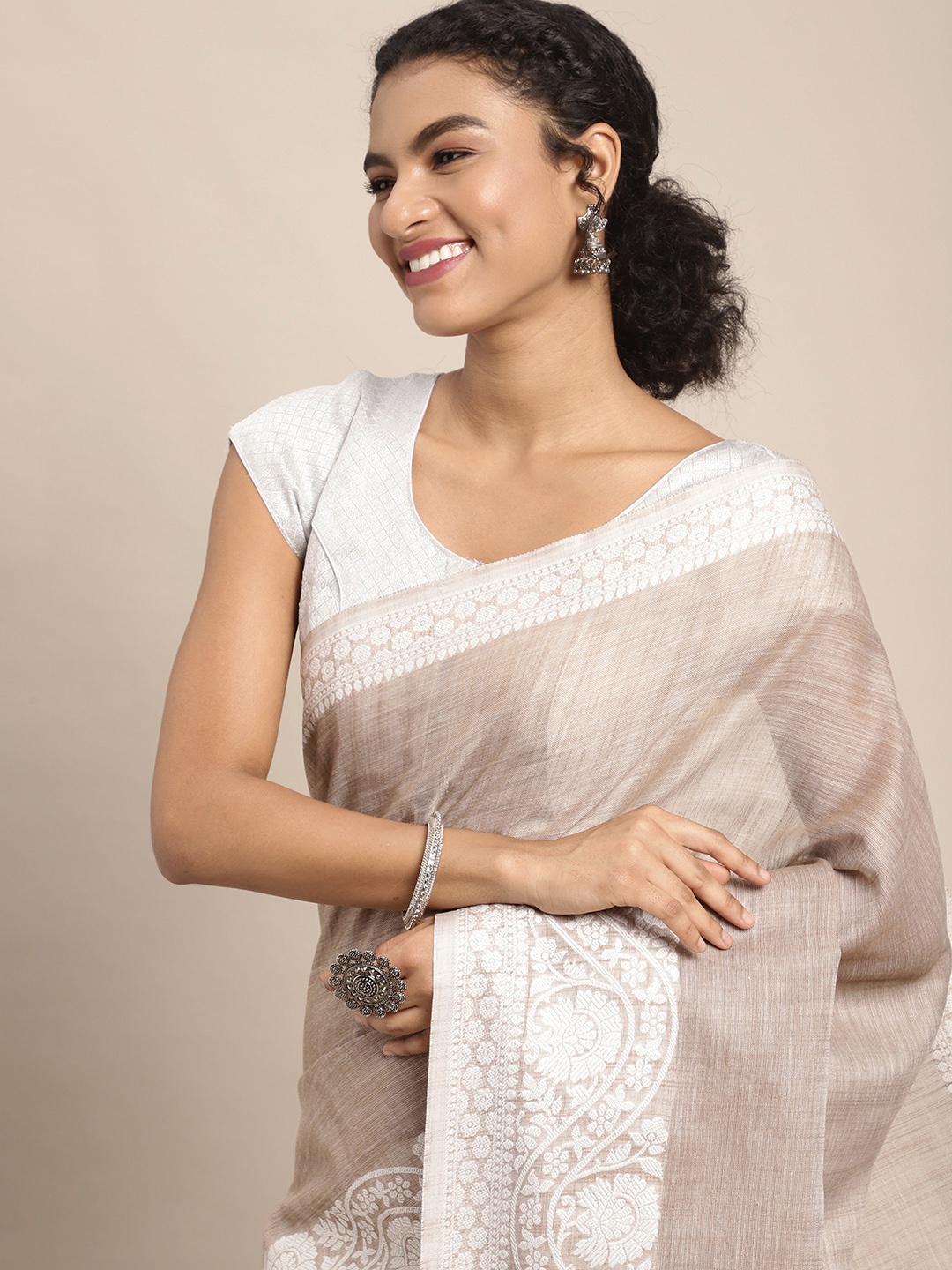 

Mitera Brown & White Ethnic Motifs Woven Design Pure Linen Saree