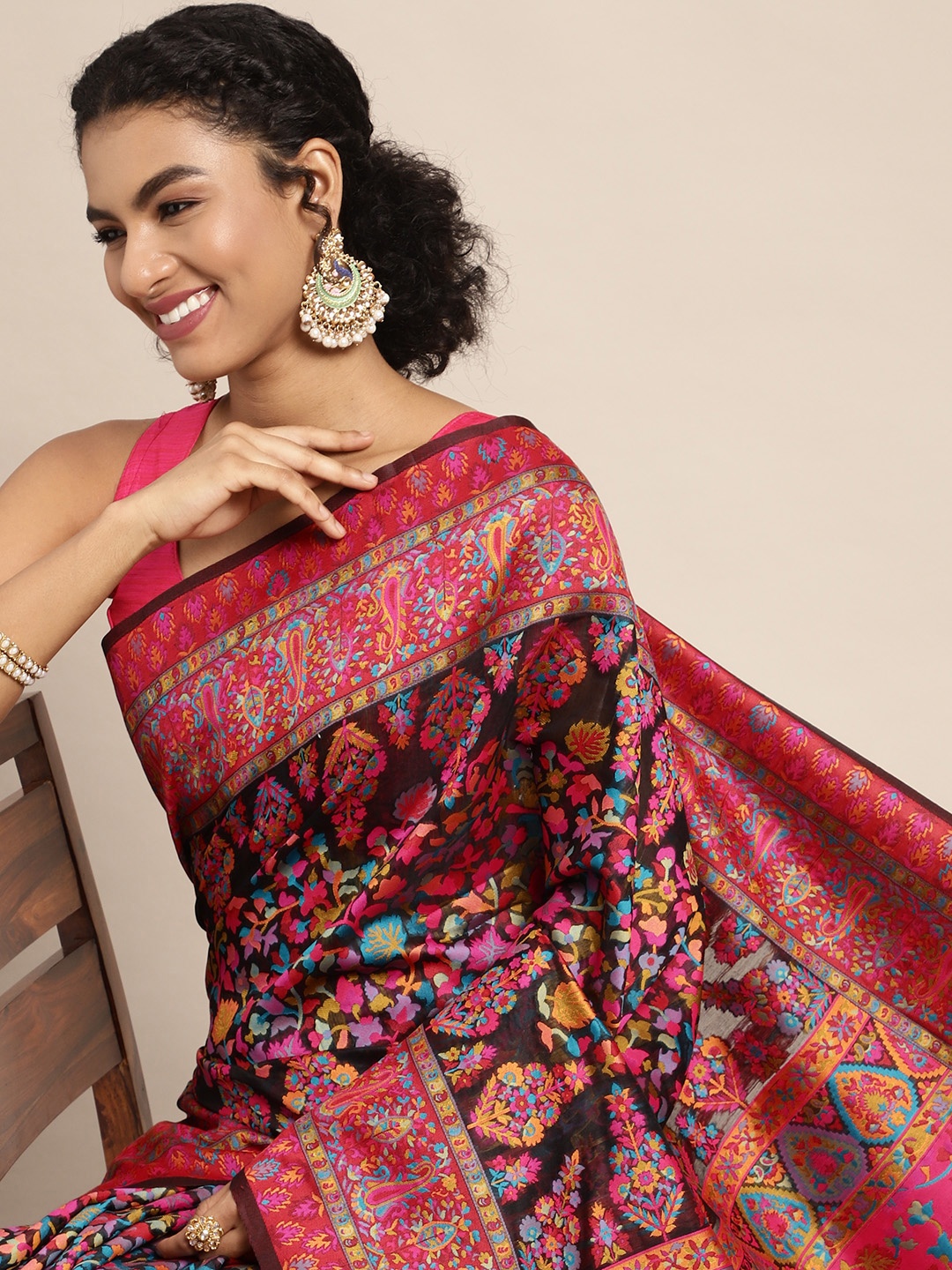 

Mitera Black & Red Ethnic Motifs Woven Design Saree