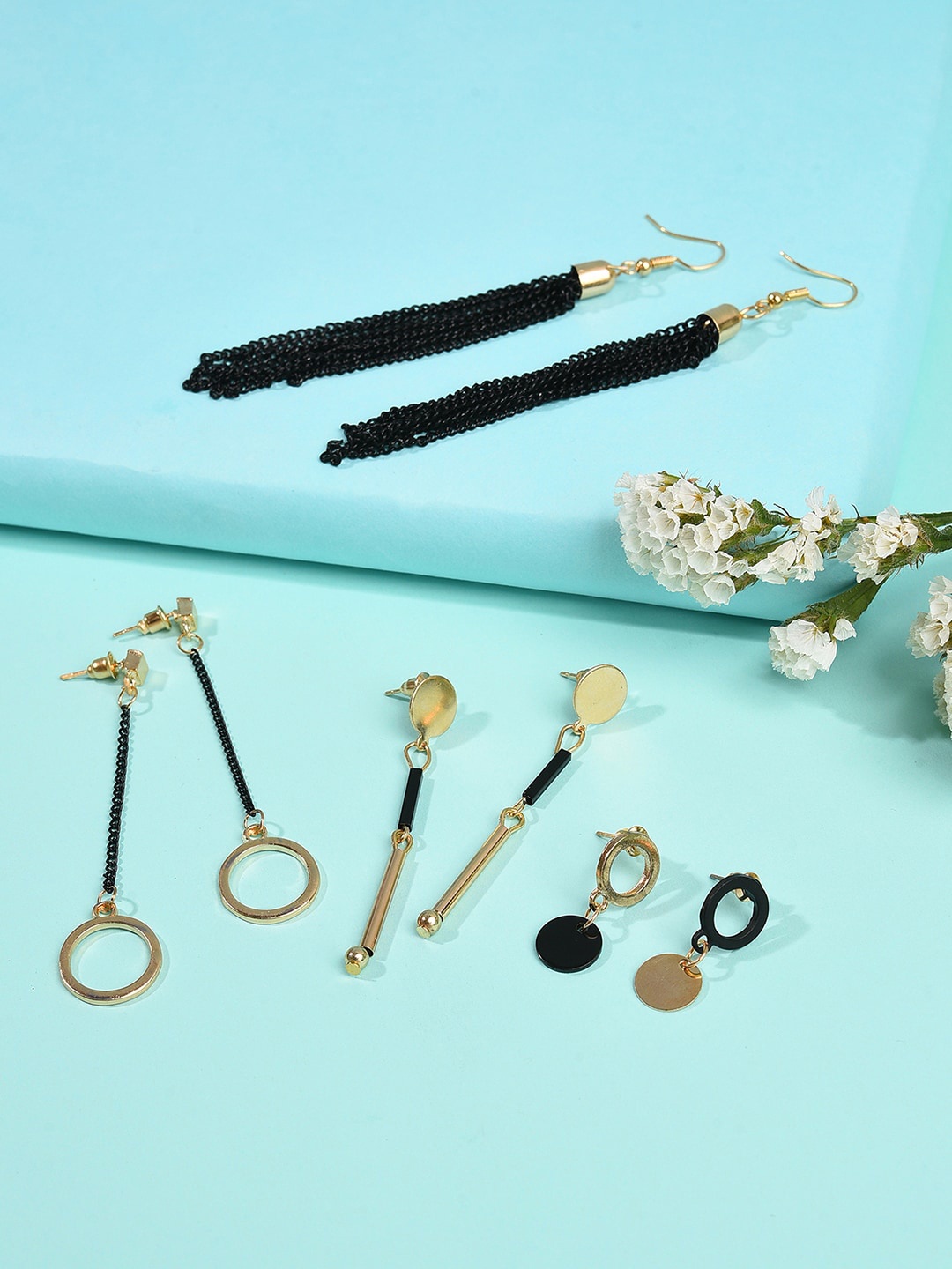 

SOHI Gold-Toned Contemporary Drop Earrings