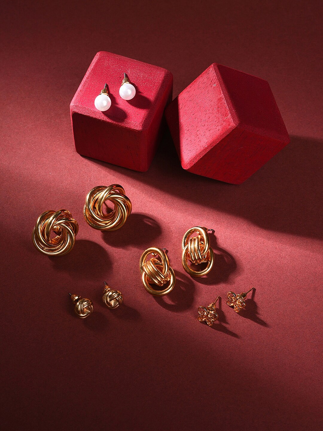 

SOHI Gold-Toned Contemporary Studs Earrings