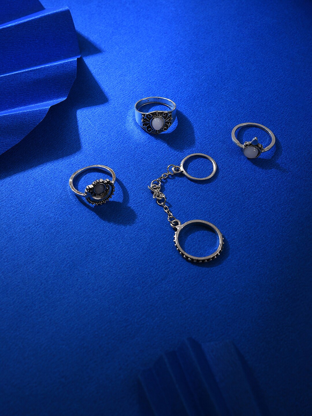 

SOHI Set of 4 Oxidised Silver-Plated White Stone-Studded Finger Ring