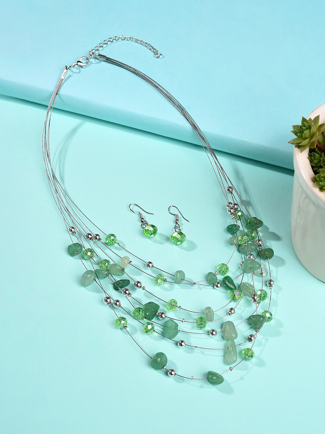 

SOHI Silver Plated Designer & Green Stone Necklace and Earring Set