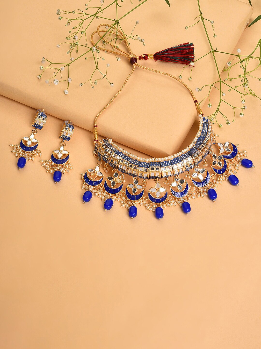 

SOHI Gold -Plated Blue Stone Studded & Beaded Jewellery Set