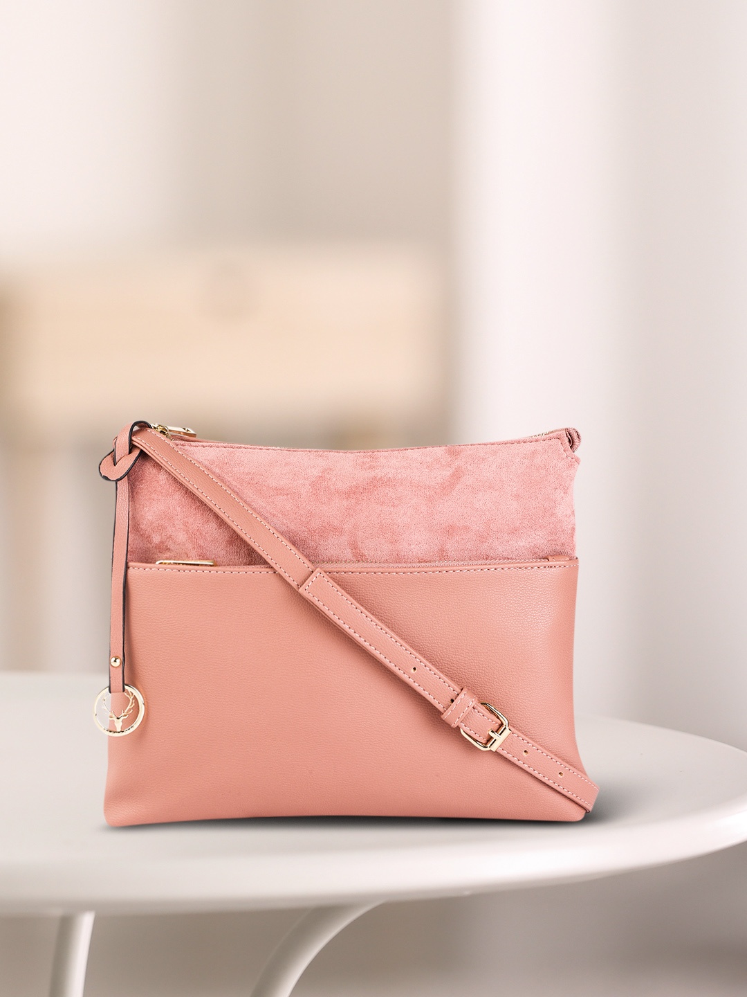 

Allen Solly Women Rose Textured PU Structured Sling Bag