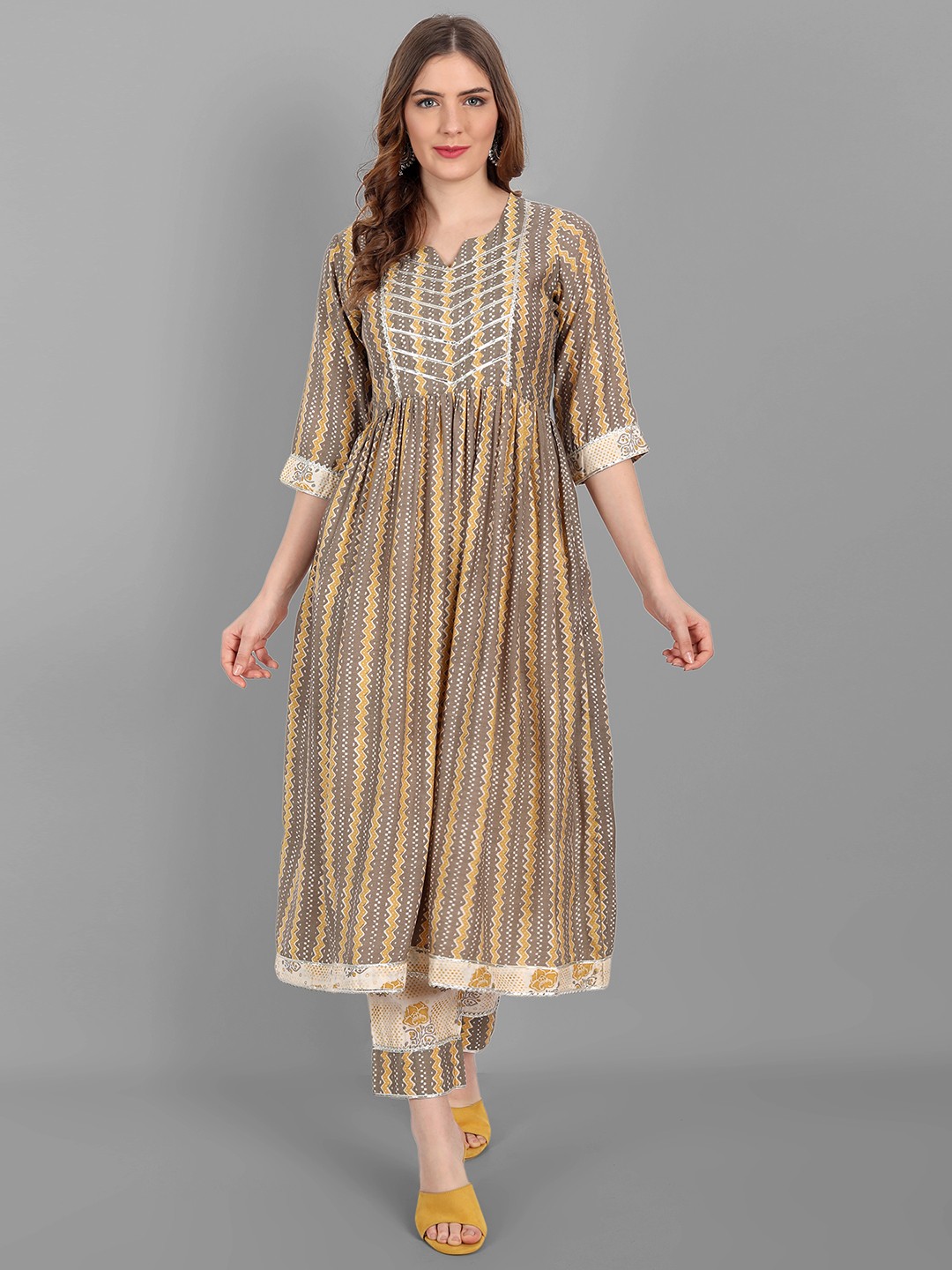 

V TRADITION Women Yellow Pleated Gotta Patti Kurti with Trousers