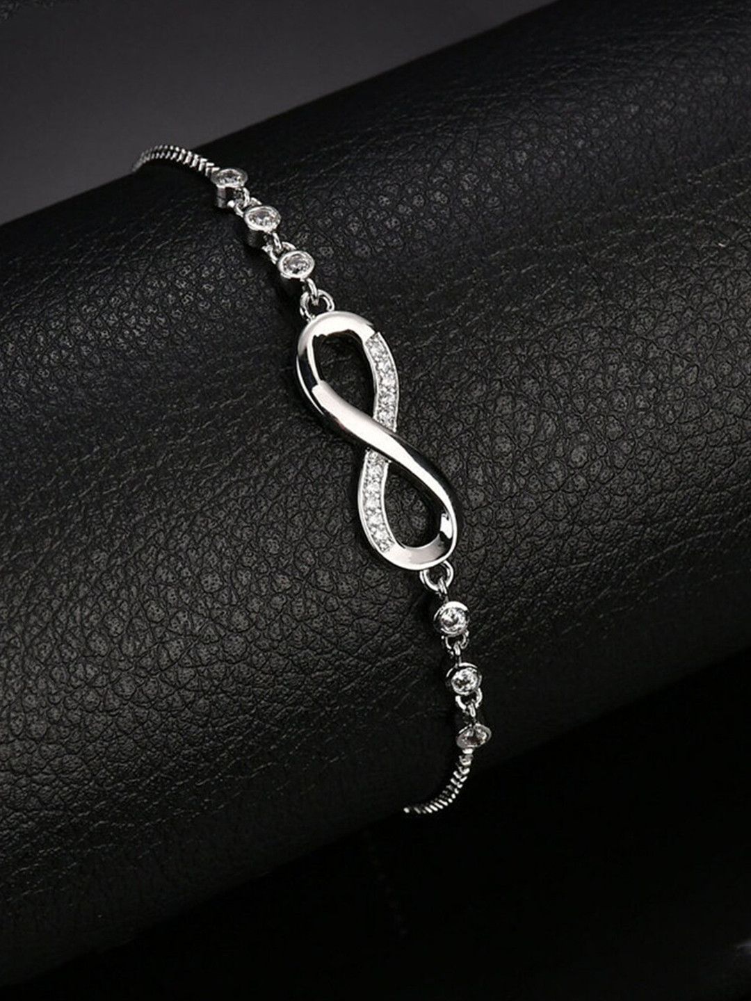 

Yellow Chimes Women Silver-Plated Brass Crystals Bangle-Style Bracelet