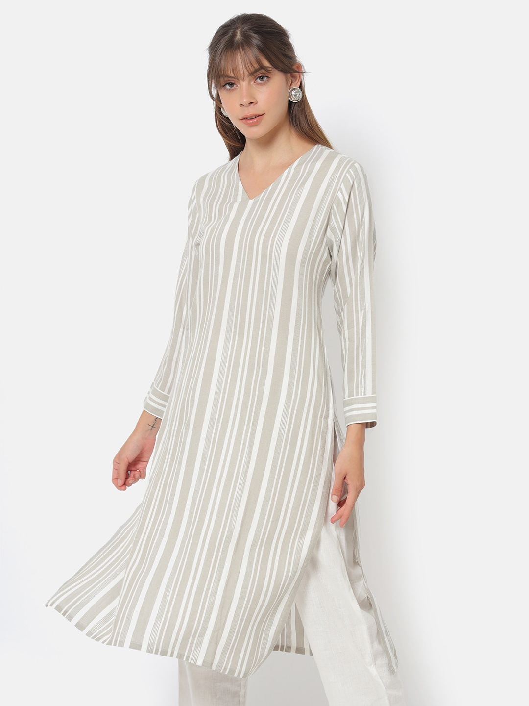 

Saaki Women Beige & White Striped Flared Sleeves Kurta