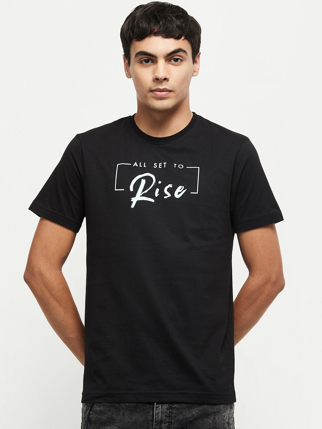 

max Men Black Typography Printed T-shirt