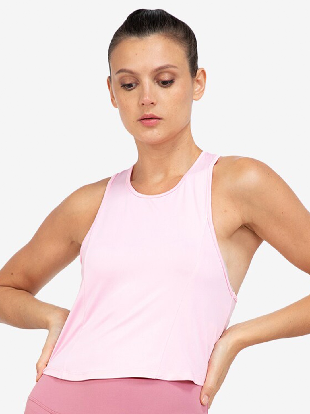 

ZALORA ACTIVE Pink Solid Round Neck Cropped Curve Hem Polyester Crop Tank Top