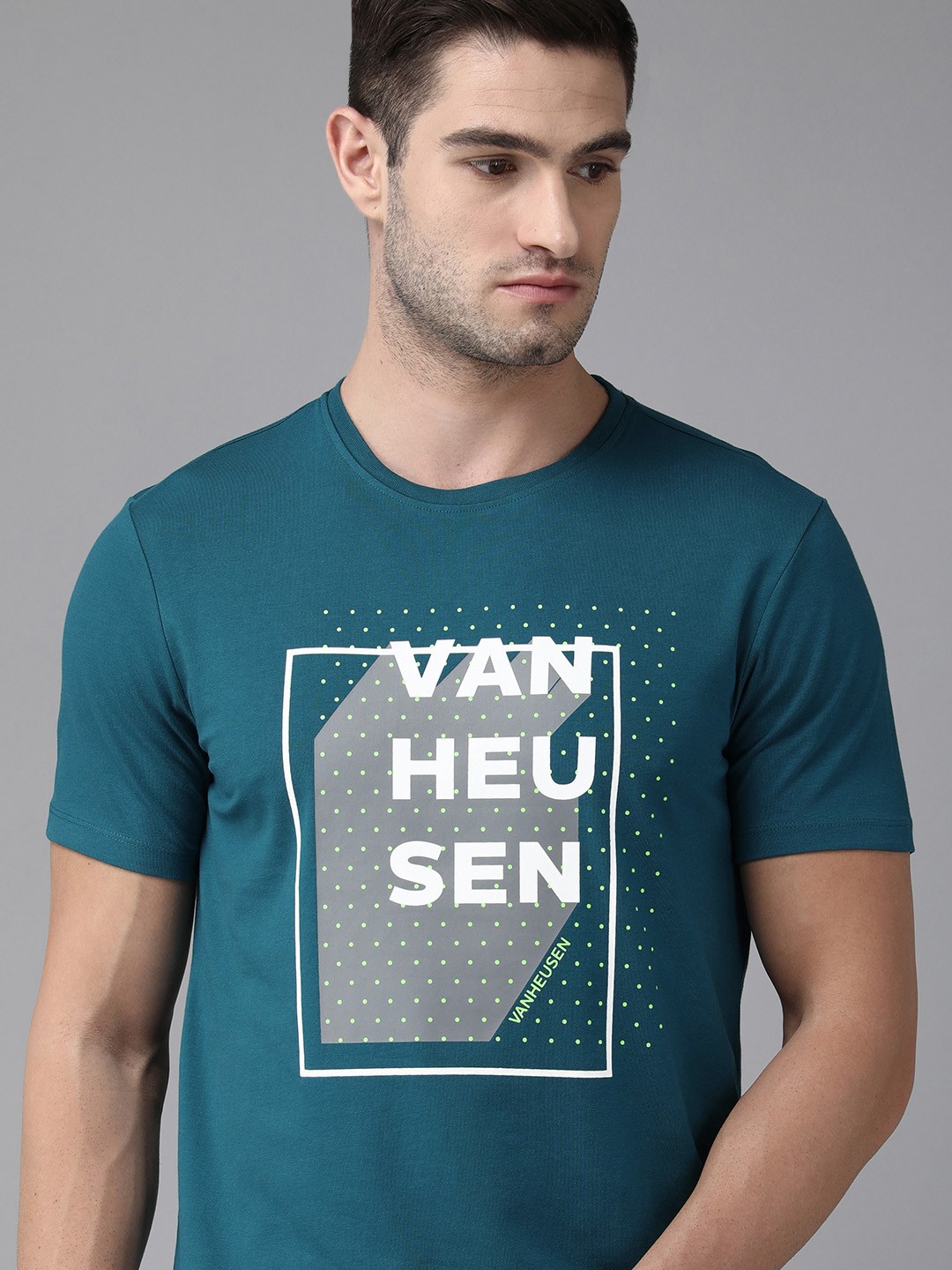 

Van Heusen Flex Men Teal & White Printed Slim Fit Sports T-shirt